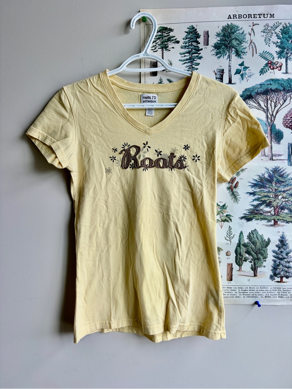 Roots Yellow V-Neck Tee with Floral Logo XS